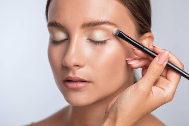 An cream eyeshadow blending done by makeup artist.