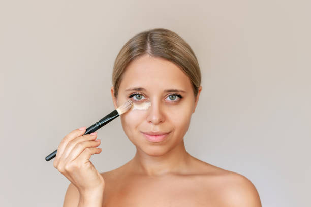 Concealer designed for sensitive eyes applied smoothly under eye