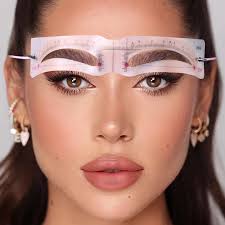 Achieving symmetrical eyebrows using reusable stencils.