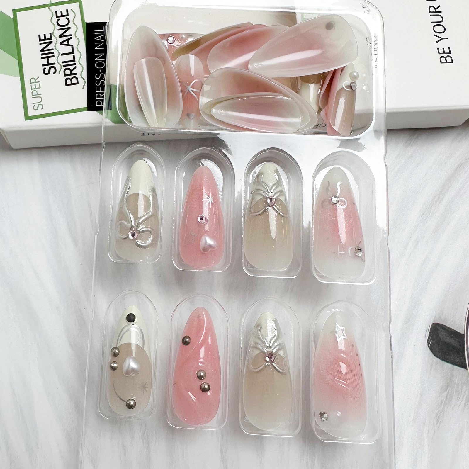 LBPEPAMZ Pink Press On Nails Medium Almond Fake Nails with 3D Silver Bow Bead Pearl Designs White Gradient French Tips Acrylic False Nails Heart Full Cover Glossy Stick On Nails for Women 24Pcs