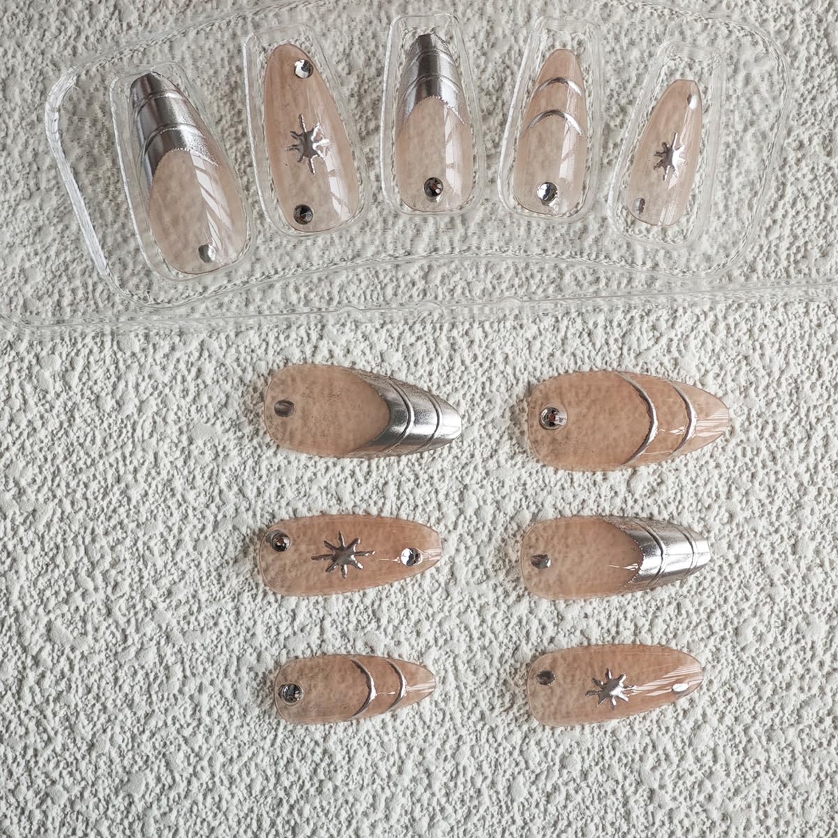 Silver Press on Nails Medium Almond Fake Nails Nude Glossy False Nail with Design Shiny Rhinestone Glue on Nails Reusable Artificial Acrylic Full Cover Star Stick on Nail for Women Manicure 24Pcs